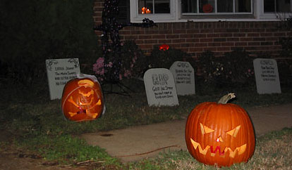 Pumpkins glowing in the graveyard